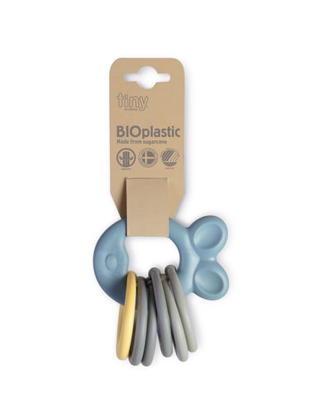 Blå aktivitetskæde med seks grå og blå legetøjsdele på brun emballage