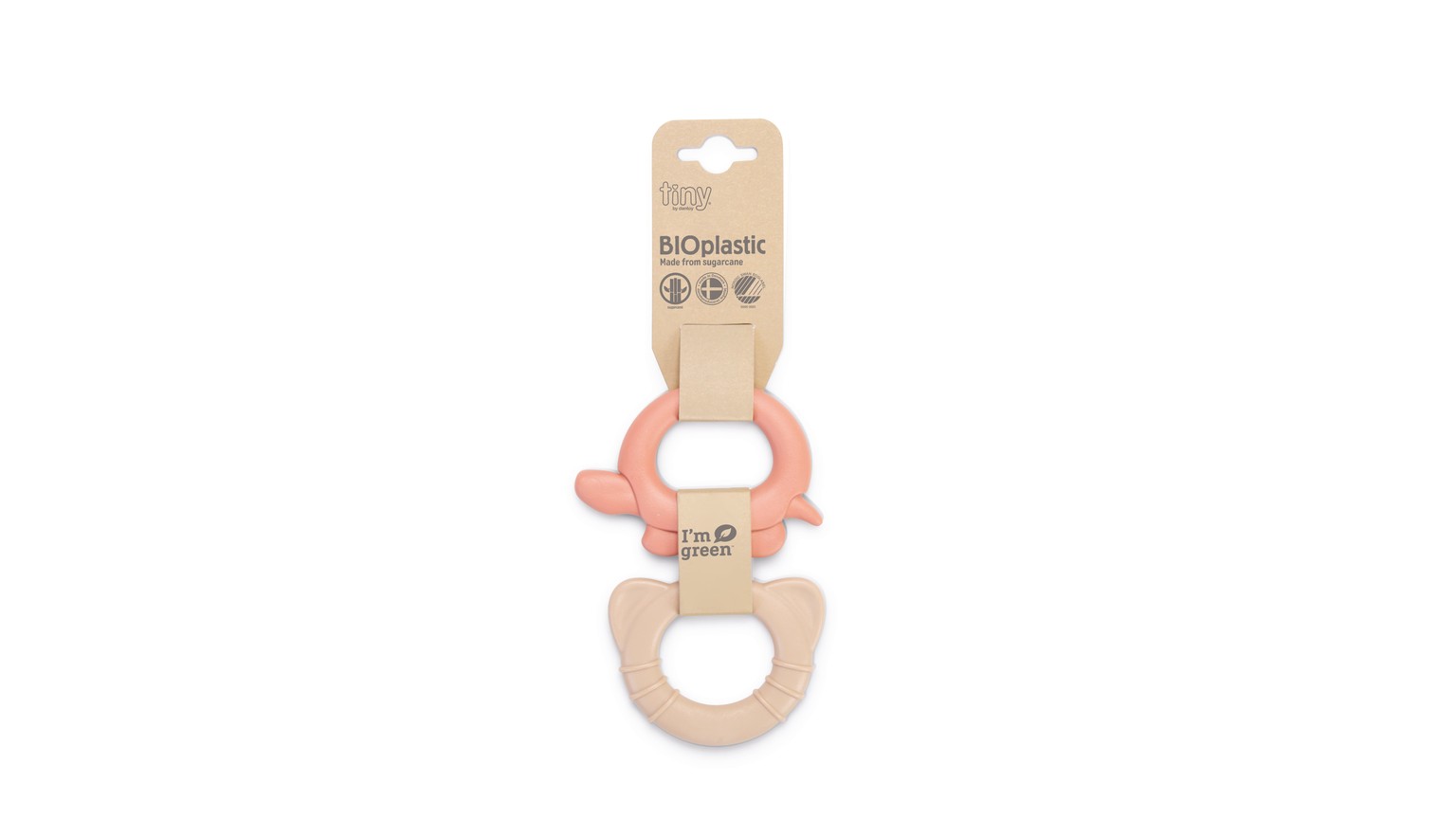 Rosa og beige bideringe til baby, sammenkoblet på brun emballage.