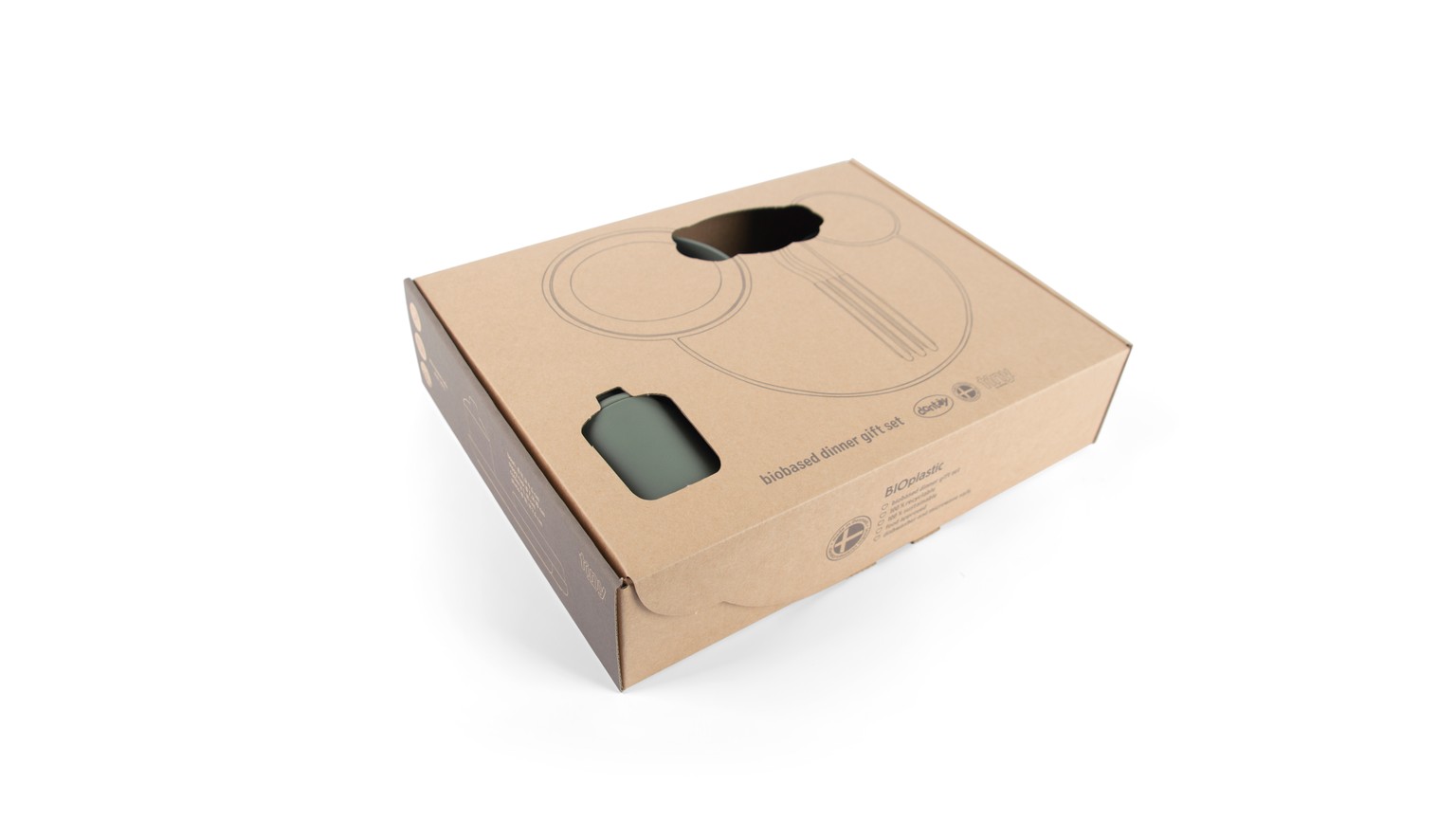 Beige firkantet gaveæske med spisestel til børn.