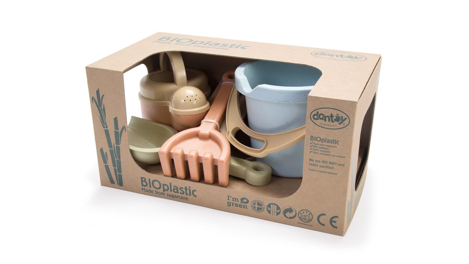 Børnelegetøjssæt med haveredskaber og spand i pastelagtige farver, præsenteret i butikskasse